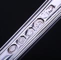 A William IV sterling silver fiddle, thread and shell pattern table fork