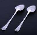 A pair of George III sterling silver Old English pattern table spoons