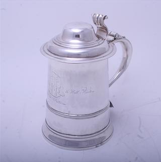 MARITIME INTEREST: A George II silver tankard