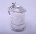 MARITIME INTEREST: A George II silver tankard
