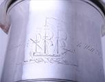 MARITIME INTEREST: A George II silver tankard