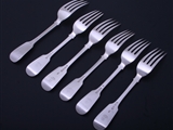 A matched set of six Victorian sterling silver fiddle pattern table forks