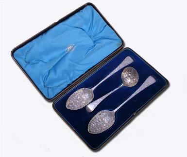 A pretty cased set of antique silver gilt 