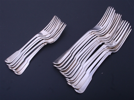 A collection of Regency fiddle pattern sterling silver forks
