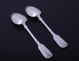 A pair of William IV fiddle pattern sterling silver table spoons