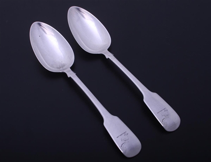 A pair of William IV fiddle pattern sterling silver table spoons