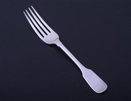 A Victorian fiddle pattern sterling silver table fork