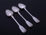A set of three William IV fiddle pattern sterling silver table spoons