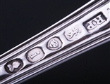 A George IV Hourglass pattern sterling silver dessert spoon