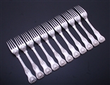 Set of eleven George IV King's pattern sterling silver table forks