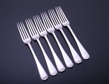 A set of six Victorian feather edge pattern sterling silver table forks