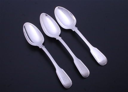 A set of three Irish William IV sterling silver fiddle and thread pattern dessert spoons