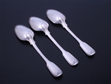 A set of three Irish William IV sterling silver fiddle and thread pattern dessert spoons