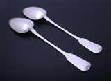 A pair of Irish George IV sterling silver fiddle pattern basting or gravy spoons