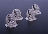 A charming set of four sterling silver armorial menu or card holders