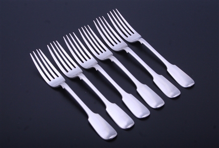 A set of six Irish Victorian sterling silver fiddle pattern table forks