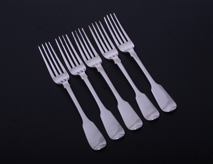 A set of five Victorian sterling silver fiddle pattern table forks