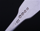 A set of four George III sterling silver fiddle pattern table forks