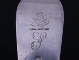 A Victorian sterling silver fiddle pattern table fork
