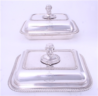 Pair of early 19th century Old Sheffield Plate entrée dishes and covers with armorial finials
