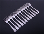 A matched set of twelve George III sterling silver Old English thread table forks