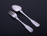 A George III fiddle pattern sterling silver table fork and spoon