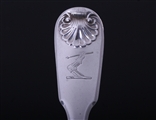 A set of eight George IV fiddle and shell pattern sterling silver table forks