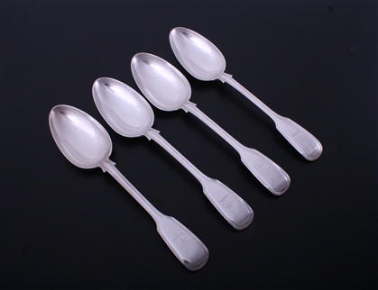 A set of four Victorian fiddle and thread pattern sterling silver table spoons