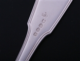 A set of eight George III fiddle, thread and shell pattern sterling silver table spoons