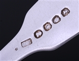 A set of six George III fiddle pattern sterling silver table forks