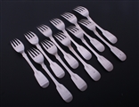 A set of eleven Irish William IV fiddle pattern sterling silver dessert forks