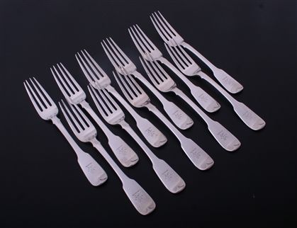 A set of eleven Irish William IV fiddle pattern sterling silver dessert forks