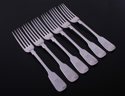 A set of six Victorian fiddle pattern sterling silver table forks