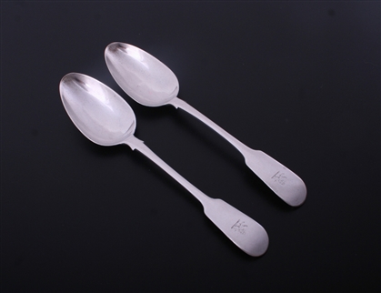 A pair of George IV fiddle pattern sterling silver table spoons