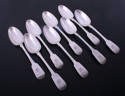 A set of eight Victorian Irish fiddle pattern sterling silver table spoons