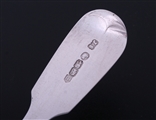 A set of eight Victorian Irish fiddle pattern sterling silver dessert spoons