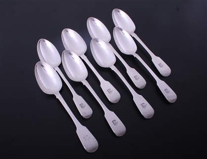 A set of eight Victorian Irish fiddle pattern sterling silver dessert spoons