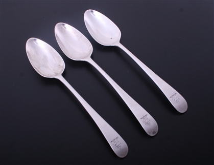 A set of three George III Old English pattern sterling silver table spoons