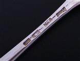 A set of three George III Old English pattern sterling silver table spoons