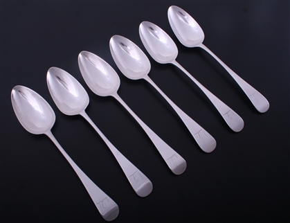 A matched set of six Irish George III Old English pattern sterling silver table spoons