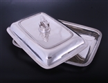 A fine pair of George III sterling silver entree dishes with armorial finials