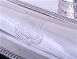 A fine pair of George III sterling silver entree dishes with armorial finials