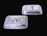 A fine pair of George III sterling silver entree dishes with armorial finials