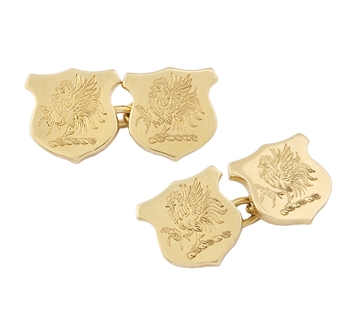 A fine pair of 18ct gold shield shaped crested cufflinks