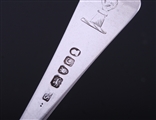 A pair of George III Hanoverian pattern sterling silver table spoons