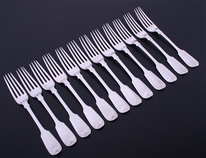 A set of twelve Victorian sterling silver fiddle pattern dessert forks