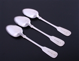 A matched set of three Victorian fiddle pattern sterling silver table spoons