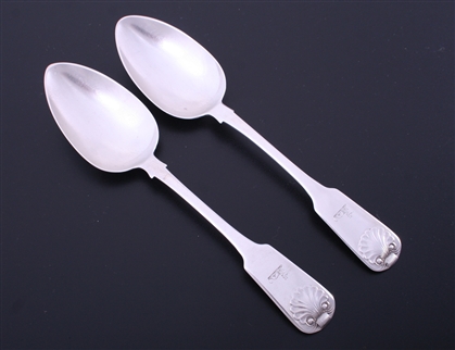 A pair of George III fiddle pattern sterling silver table spoons