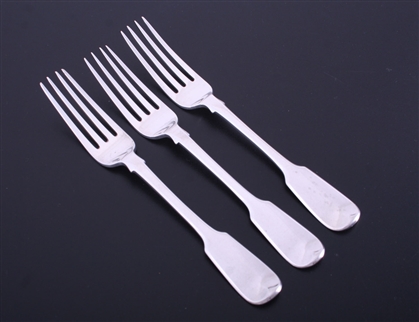 A set of three George IV fiddle pattern sterling silver table forks