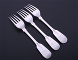 A set of three George IV fiddle pattern sterling silver table forks